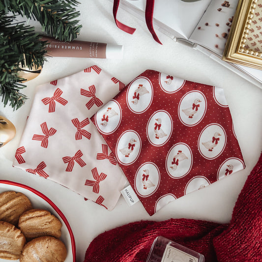 Vintage Goose & Christmas Bows dog bandana on a flatlay
