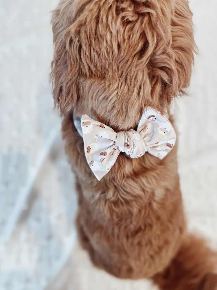 Boho Santa’s knotted pup bow